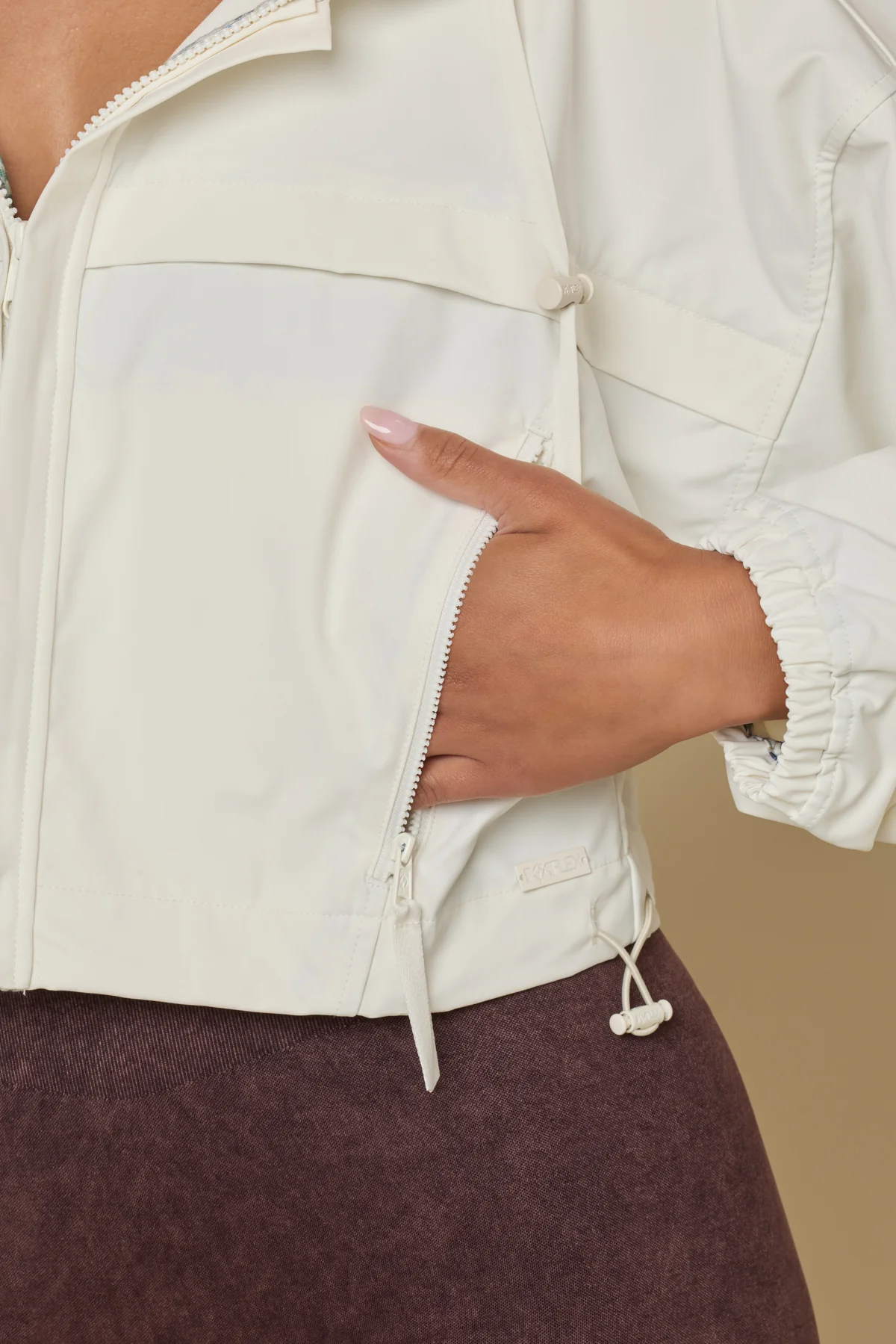12389-packable-windbreaker-coconut-cream-1.webp