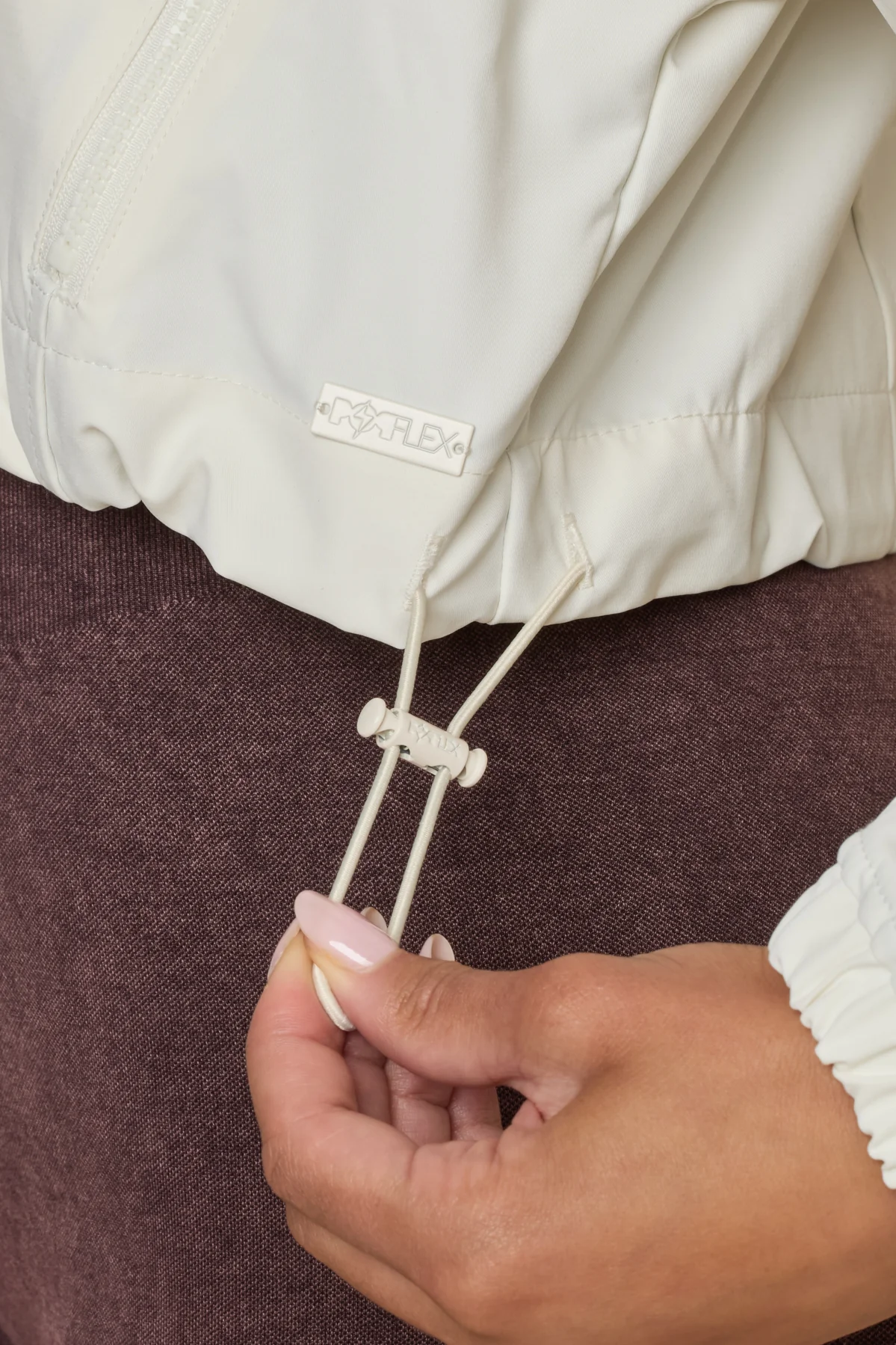 12389-packable-windbreaker-coconut-cream-1.webp