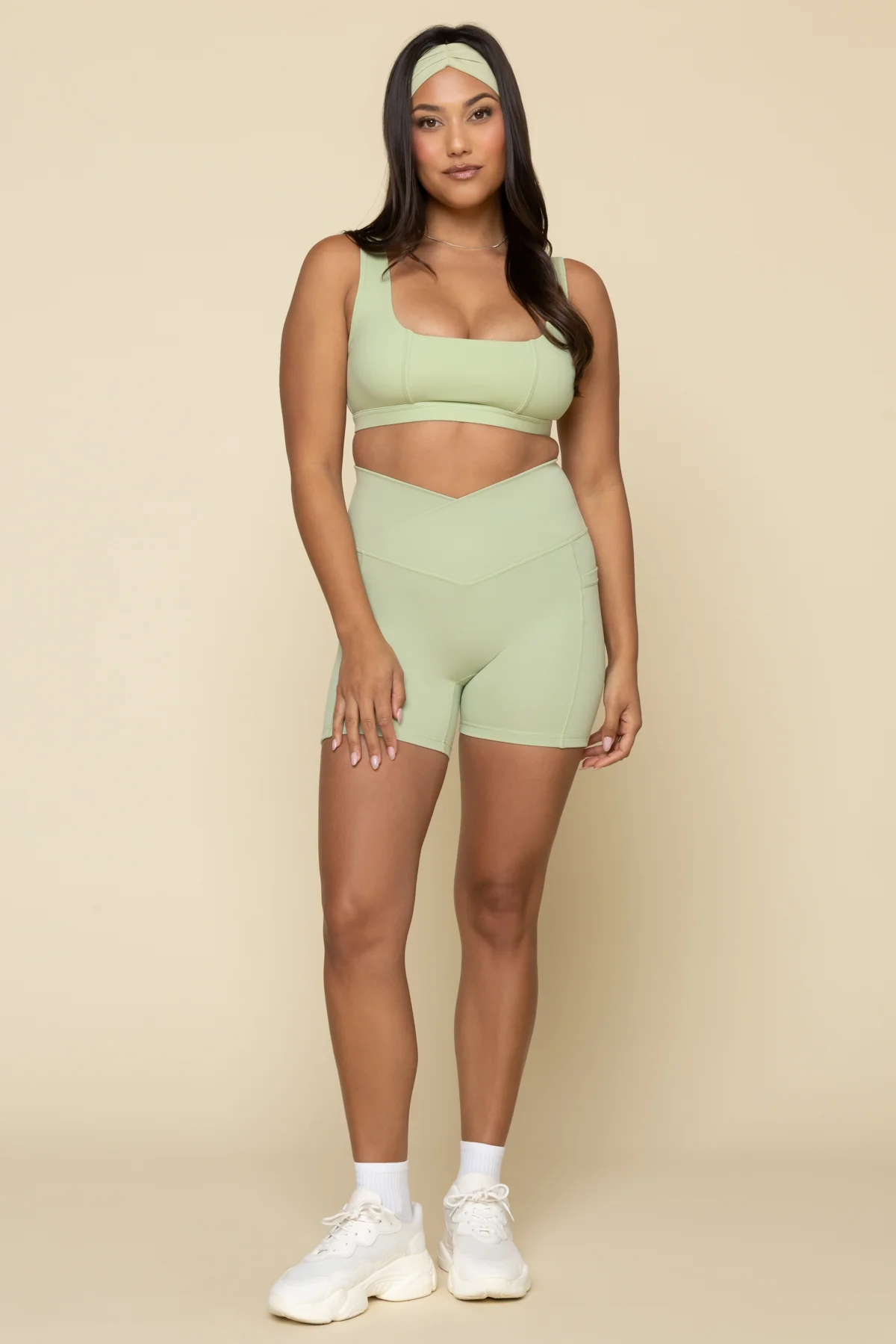 5896-crisscross-hourglass-midi-short-with-pockets-pistachio-1.webp